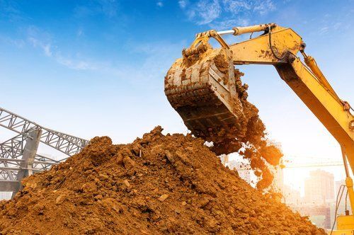 scavare il terreno in cantiere