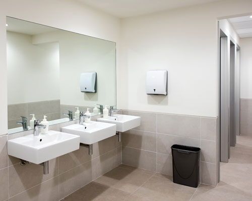 Restroom with hand basins — Plumbing Repairs in Orland Park, IL Restroom with hand basins — Plumbing Repairs in Orland Park, IL