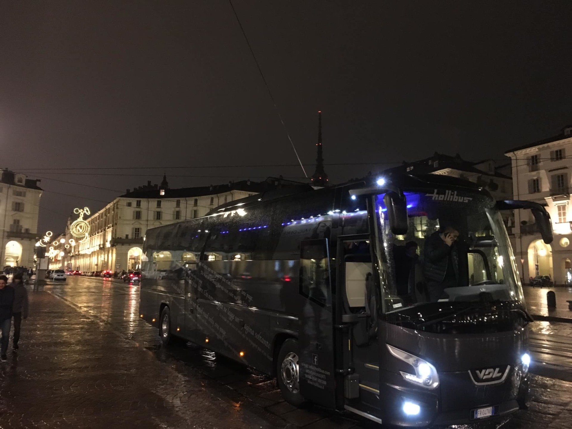 Coach on the road by night
