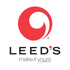 The logo for leeds make it yours is a red circle with a swirl in the middle.