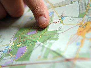 Someone pointing to a map