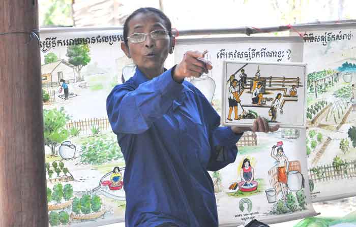 HOPE Cambodia staff gives a lesson on health and hygiene
