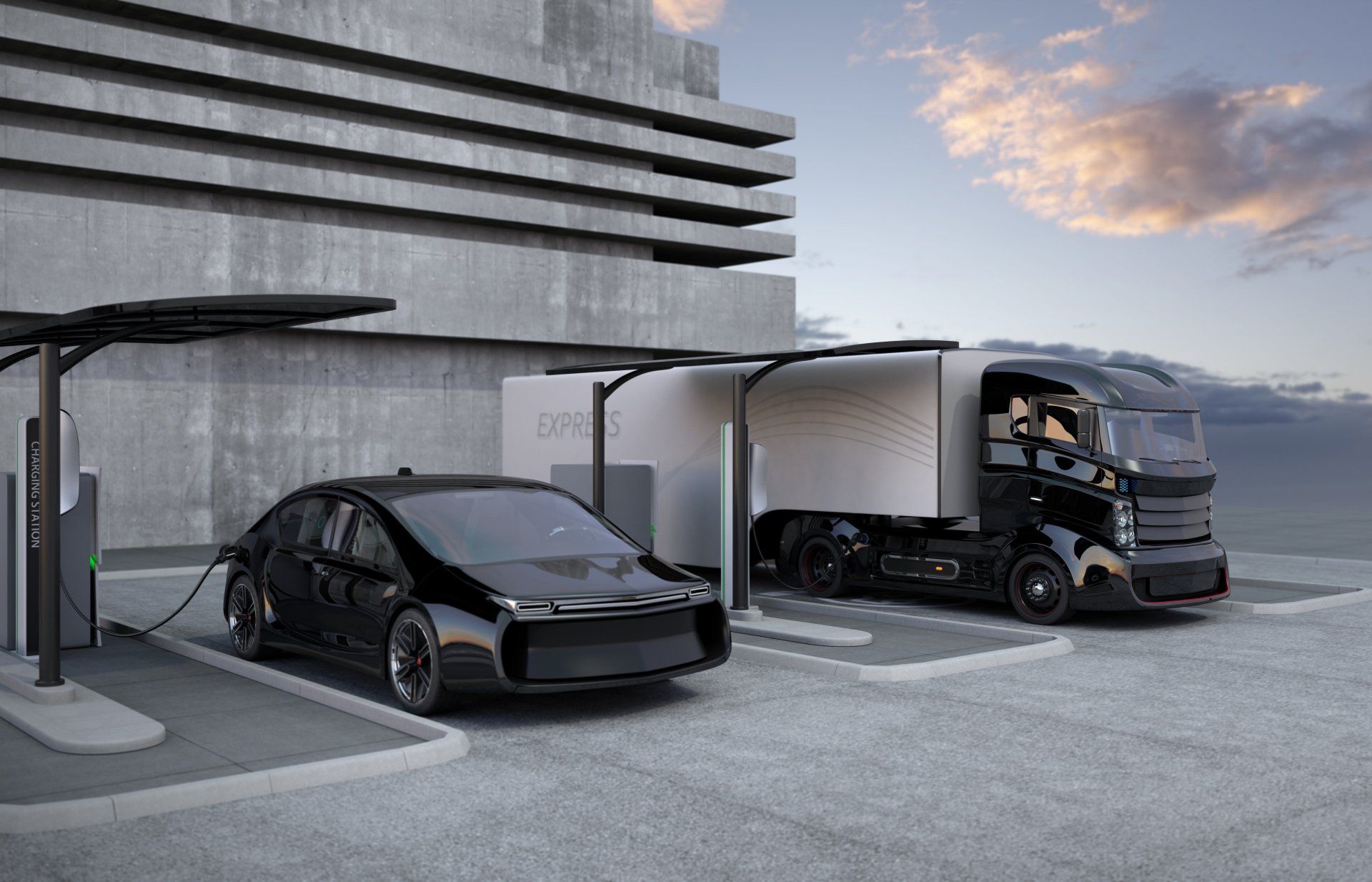A car and a truck are being charged at a charging station.