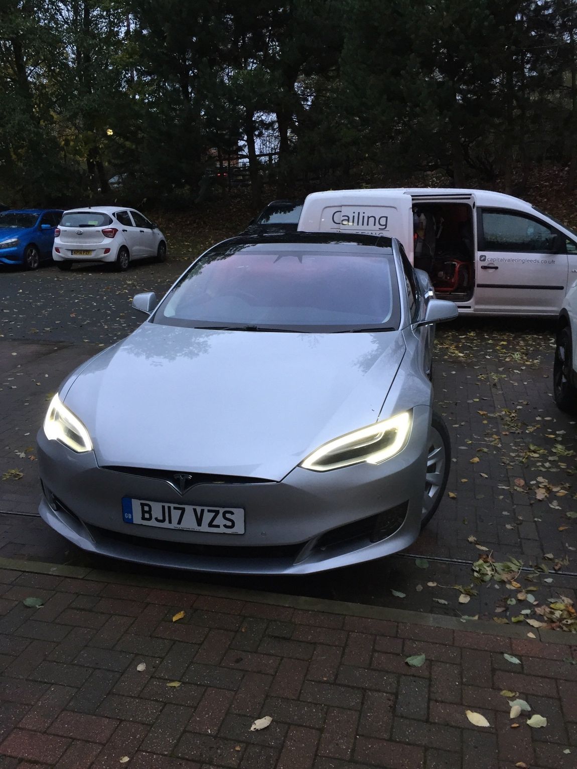 Silver car front with lights