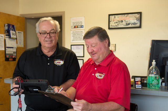 Clutch — Two Man Smiling in Apopka, FL