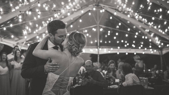 DJ Productions newlywed couple kissing during first dance