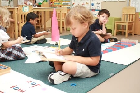 Students studying - Preston Creek Montessori in Plano, TX Students studying - Preston Creek Montessori in Plano, TX