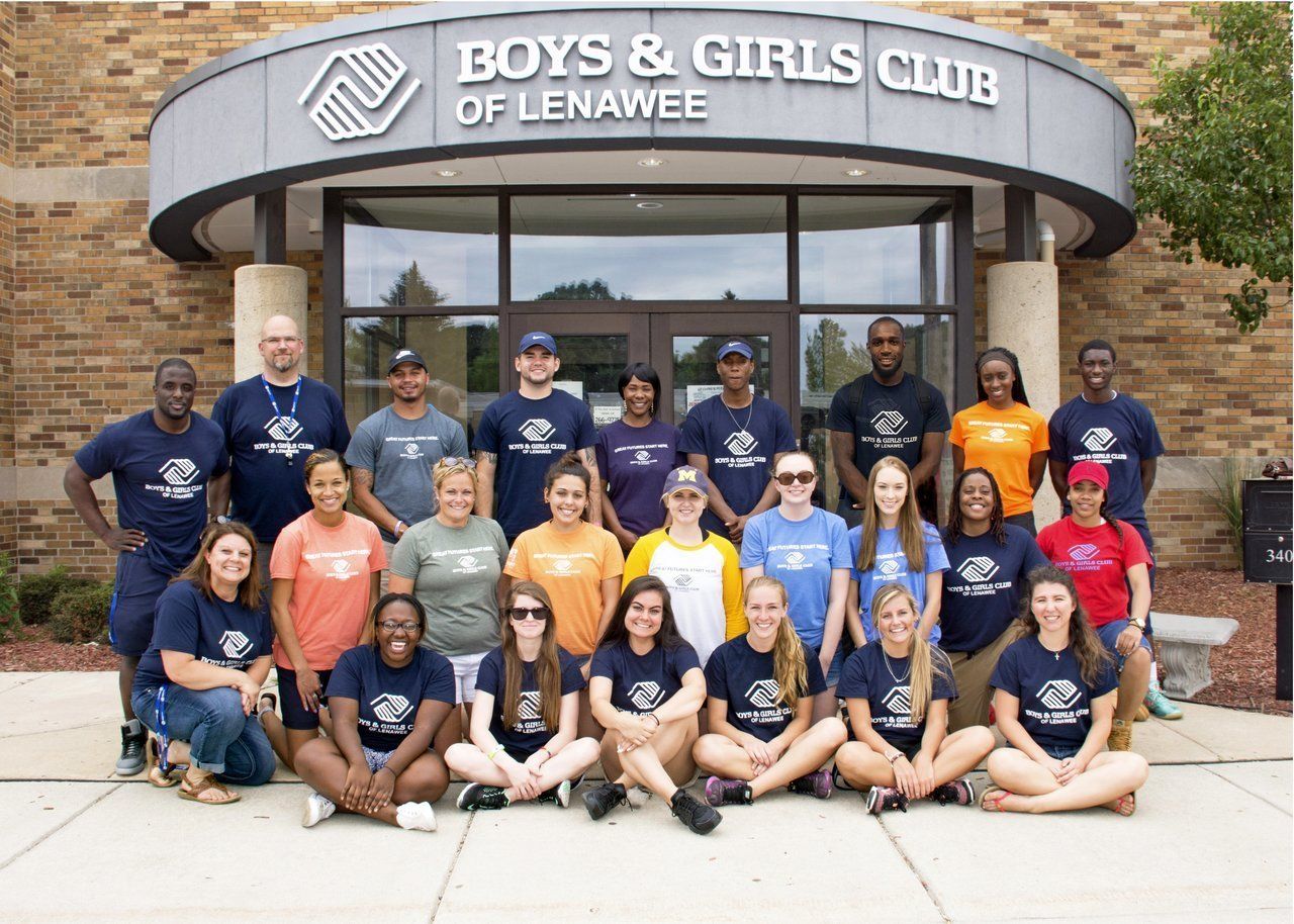 Staff members in front of the Boys & Girls Club of Lenawee