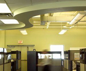 Offering suspending lighting options for your business. Call 01483 306 500 Suspended lights in office in Hampshire