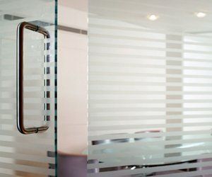 Sliding screens for that individual look to your office. Call 01483 306 500 Glass door and glass wall