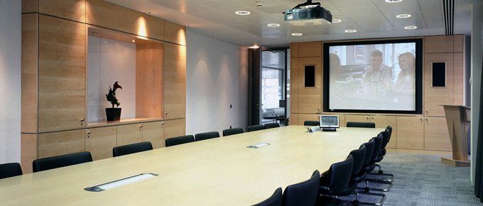 Office fitting specified to you and your business. Call now on 01483 306 500 Boardroom with projector, available from Marrick Commercial Interiors for Basingstoke, Woking and surrond