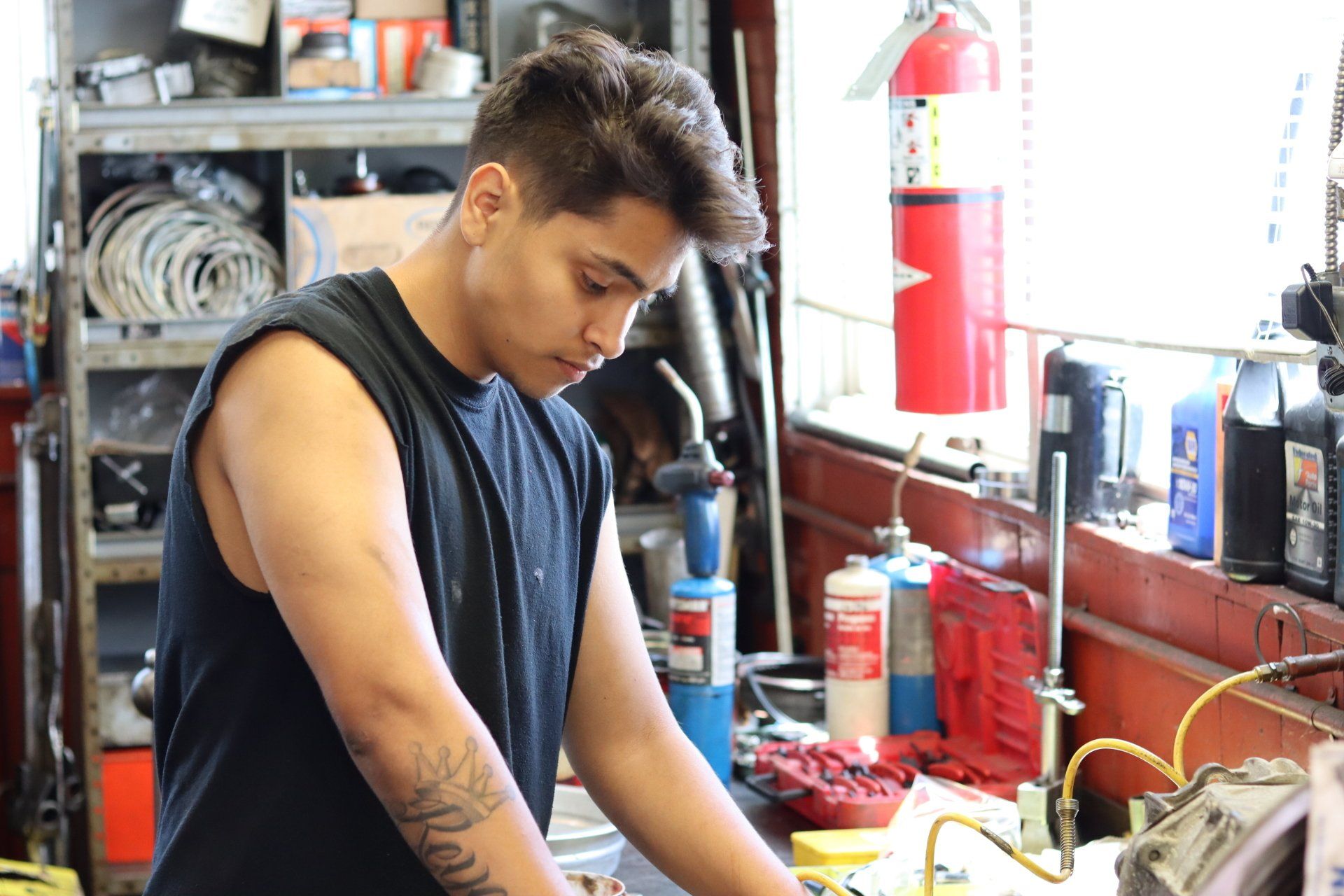 Auto Transmission Diagnostics — Mechanic Looking At Diagnostic Computer in Toughkenamon, PA
