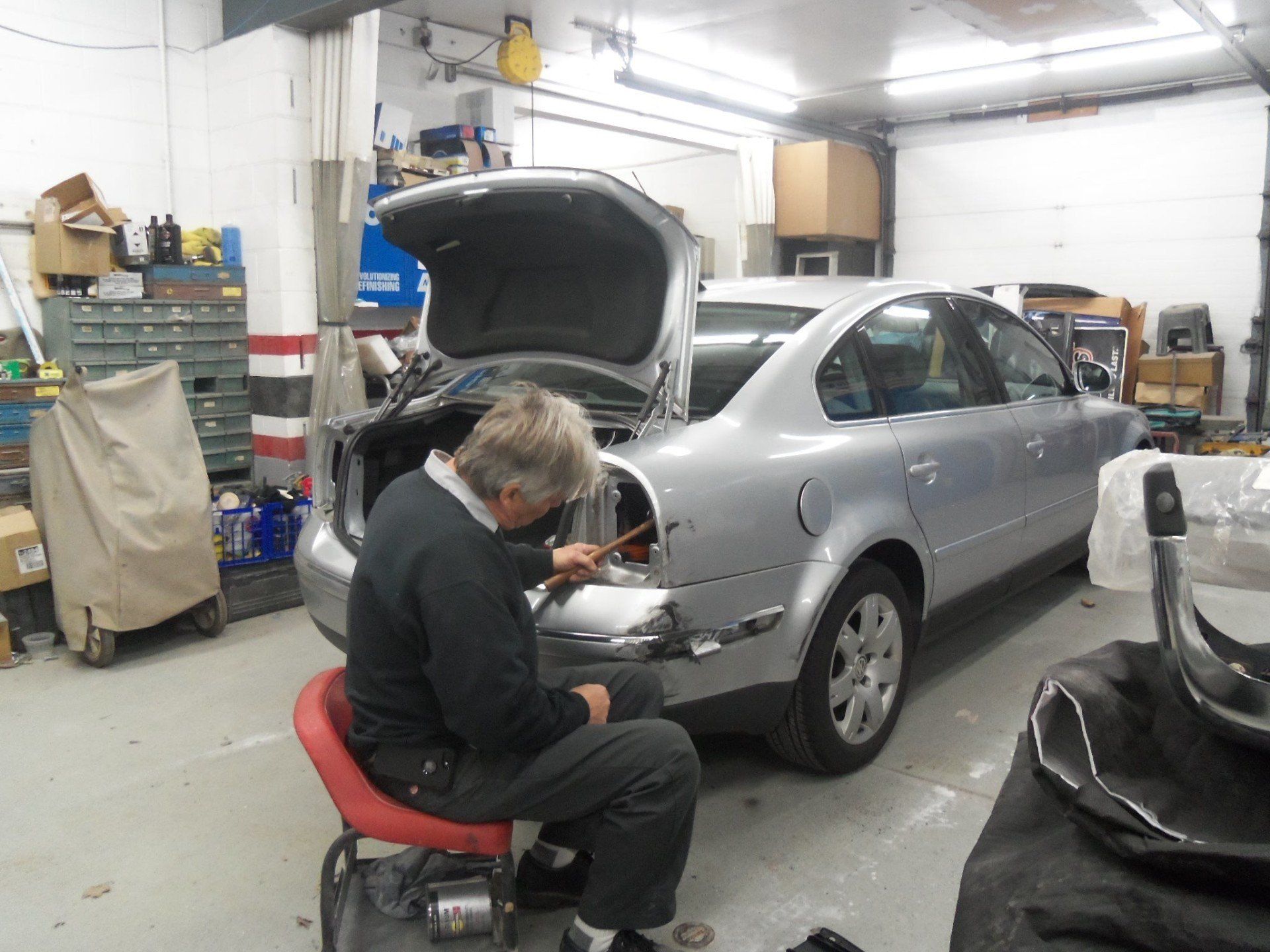 Man Removing Dents — Villas, NJ — John's Auto Body