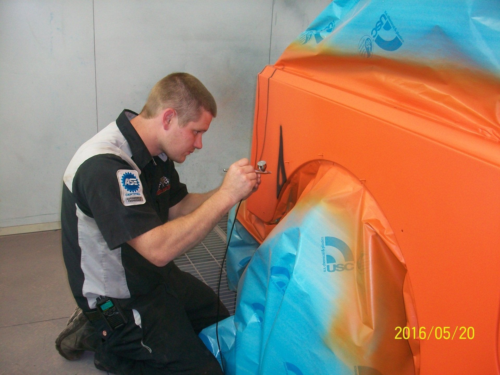 Man Adding Paint Details — Villas, NJ — John's Auto Body