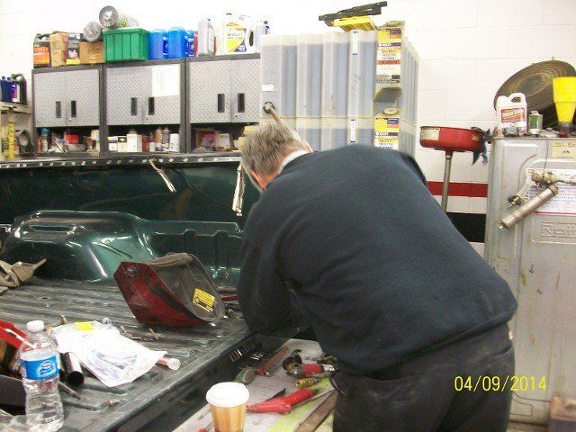 Mechanic Repairing Truck — Villas, NJ — John's Auto Body