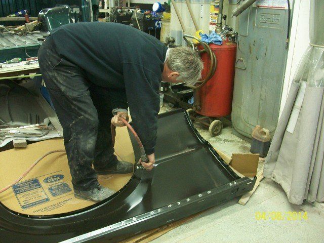 Man Cutting Car Body Part — Villas, NJ — John's Auto Body