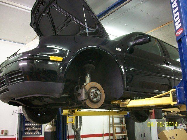 Removed Front Wheel of Vehicle — Villas, NJ — John's Auto Body