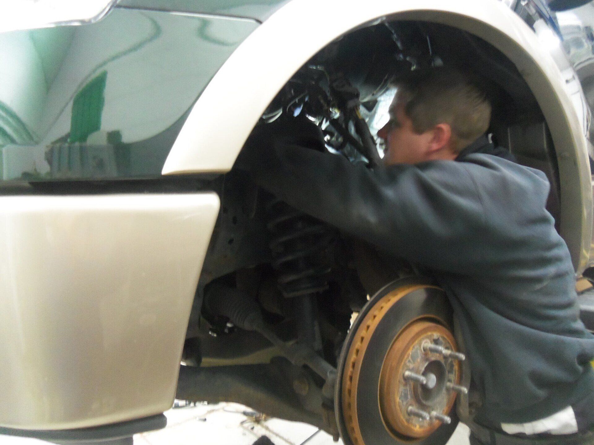Man During SUV Repair — Villas, NJ — John's Auto Body