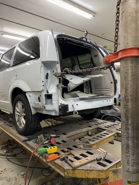 SUV in Garage — Villas, NJ — John's Auto Body