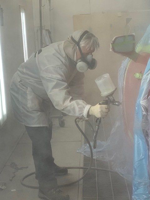 Man Painting Car in Garage — Villas, NJ — John's Auto Body