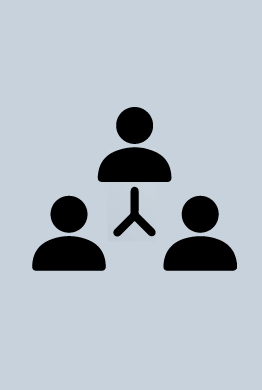 A group of people are sitting around a table.