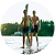 Two people standing on a paddleboard in calm water, holding paddles with a forested shoreline behind them.