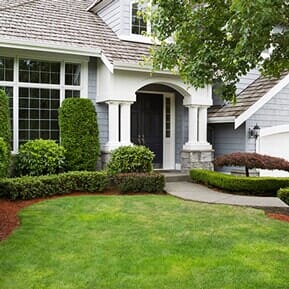 Elegant landscaping in modern house — Landscape Installation & Maintenance in Albuquerque, NM