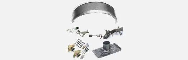 Exploded view of metal parts including a circular, curved piece, brackets, and fixtures.