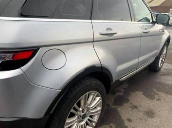 Silver range rover evoque side view