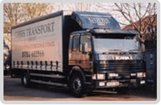 Gibbs Transport black and silver truck 