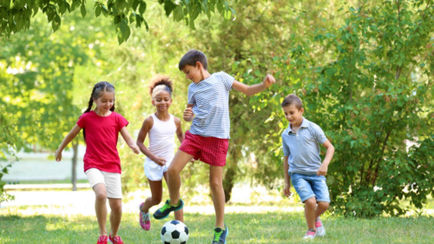 kids playing a soccer ball