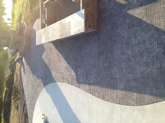 Brick liner pool - stamped concrete in Churubusco, IN