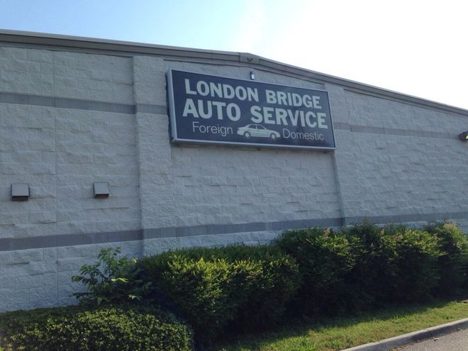 Sign for London Bridge Auto Service, a shop that services foreign and domestic cars.
