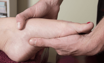 A foot being examined
