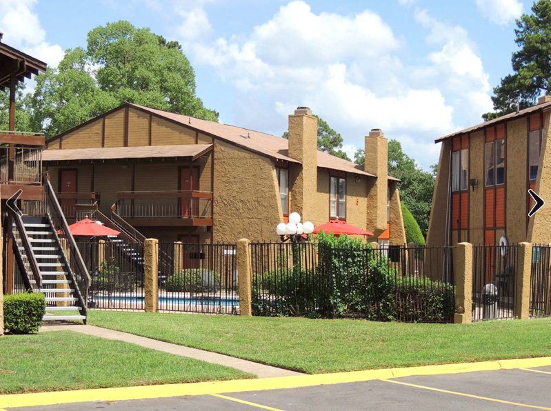 Kingwood Forest Apartments exterior on a sunny day