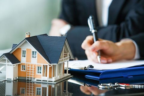 Mortgage — Man Signing Contract in Winter Haven, FL Mortgage — Man Signing Contract in Winter Haven, FL