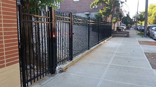 Fence along the side walk—Security Fence in Bronx, NY