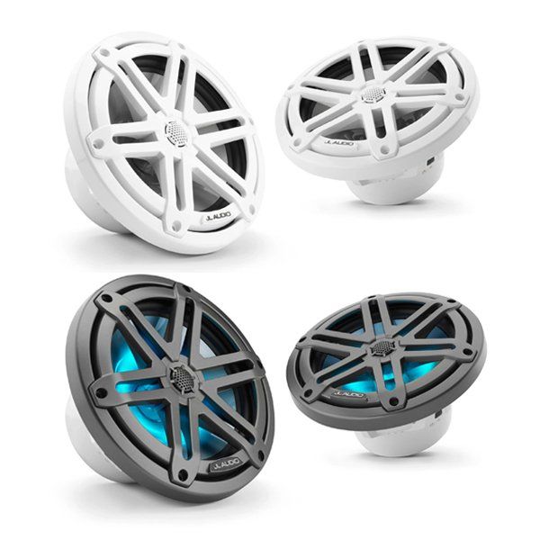 Four different colored speakers on a white background