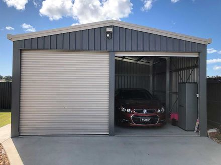 Garage With Red Car - Home Improvement in Torquay, QLD Garage With Red Car - Home Improvement in Torquay, QLD