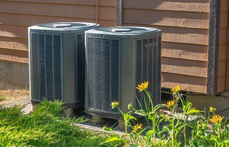 Heating Repair — AC-Heater Inverter Units Outside an Apartment in Concord, NC Heating Repair — AC-Heater Inverter Units Outside an Apartment in Concord, NC