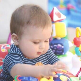 Infant playing at day care - Hilltop Nursery Schools in Toms River, NJ Infant playing at day care - Hilltop Nursery Schools in Toms River, NJ
