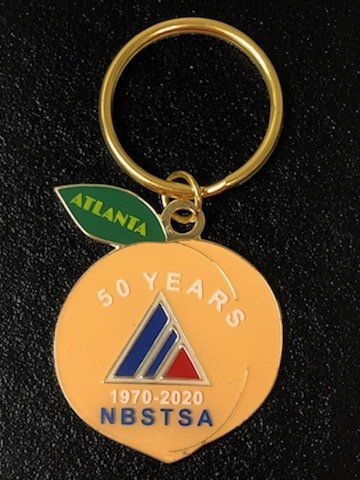 A keychain that says atlanta 50 years 1970-2020 nbtsa