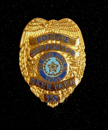 A gold badge that says police supporter deer park tx