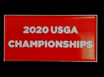 A red sign that says 2020 usga championships on it