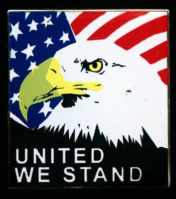 A united we stand sign with an eagle and an american flag