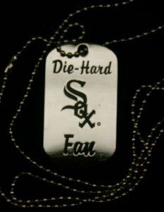 A dog tag that says die-hard sox fan on it