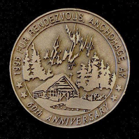 A coin commemorates the 60th anniversary of fur rendezvous anchorage ak