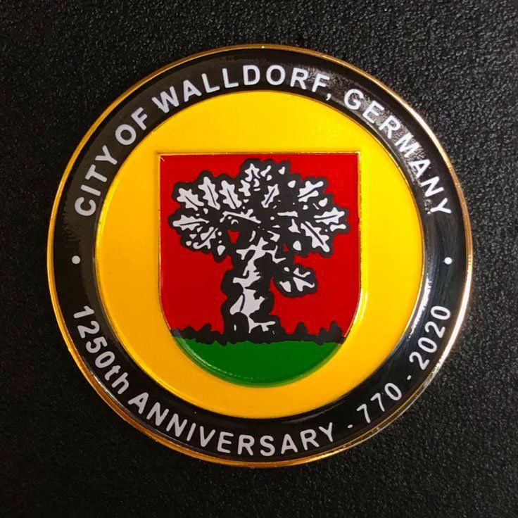A coin that says city of walldorf germany 1250th anniversary