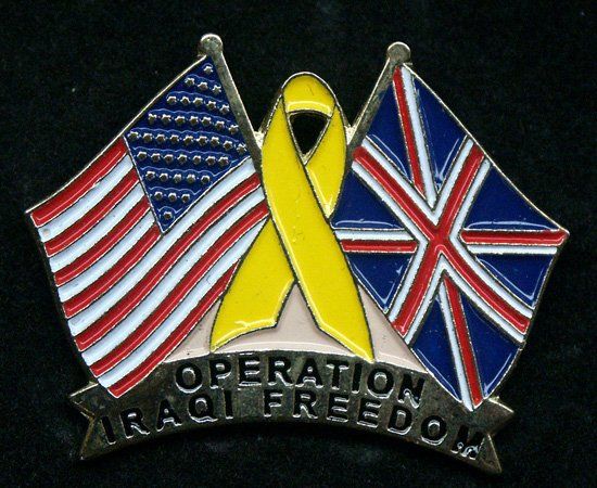 A pin that says operation iraqi freedom on it