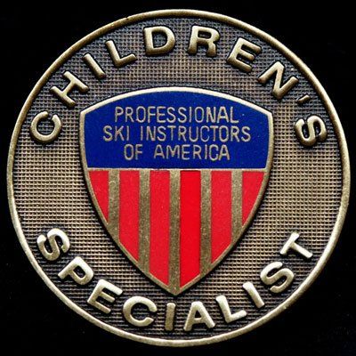 A badge that says children 's specialist on it